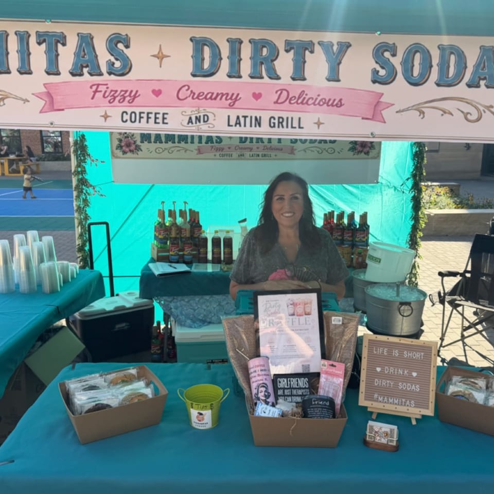 Mammitas team member at a Dirty Sodas pop-up stand